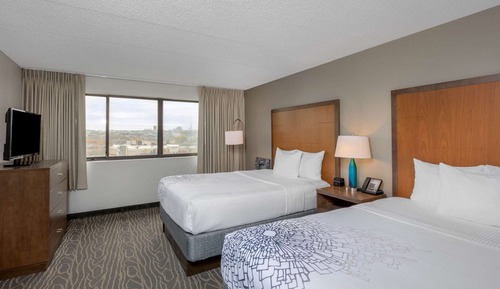 Suite Deluxe, 2 camas de matrimonio, no fumadores, vistas a la ciudad