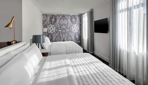 Habitación, varias camas