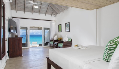 Habitación superior, 1 cama de matrimonio grande, frente a la playa (Deluxe)