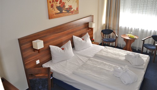 Habitación Confort con 1 cama doble o 2 individuales