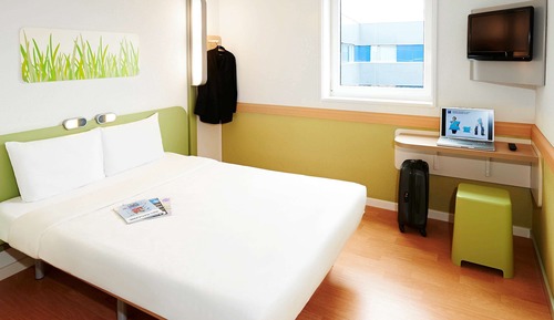Habitación triple, varias camas