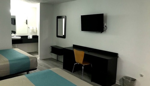 Habitación Deluxe, 2 camas de matrimonio, fumadores, frigorífico y microondas