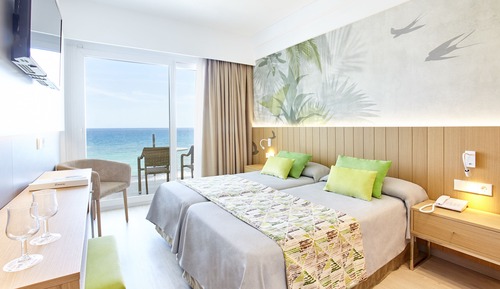 Habitación doble, vistas al mar (2 adultos + 1 niño)