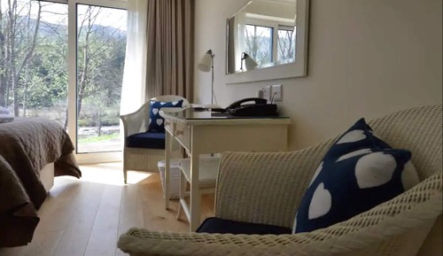 Habitación Deluxe con 1 cama doble o 2 individuales, vistas al jardín, en edificio anexo