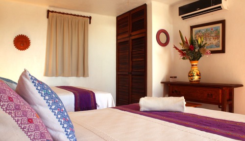 Habitación, 2 camas de matrimonio, vistas parciales al mar