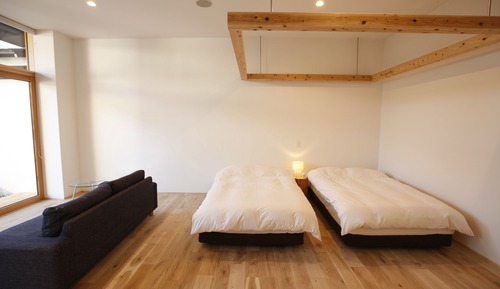 Habitación triple superior, vistas al jardín