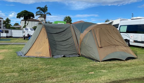 Garden Powered Slab Site - with Shared Bathroom. Bring your own Caravan or Tent