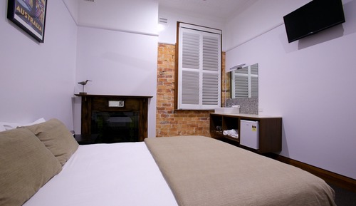 Habitación Deluxe, 1 cama de matrimonio, baño compartido