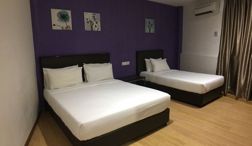 Habitación triple Deluxe