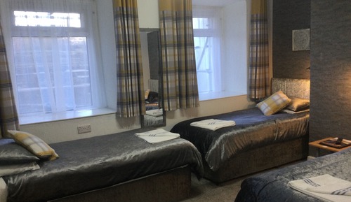 Lower Ground Floor Street Facing Triple Room