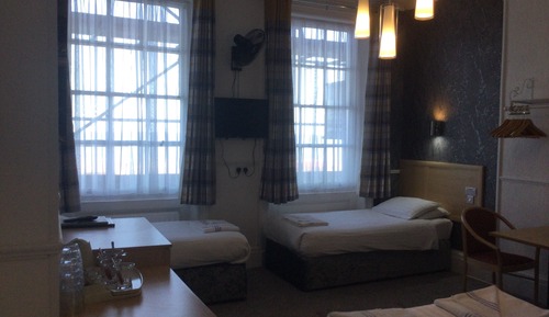 Habitación cuádruple Premium, varias camas, baño privado, vistas al mar