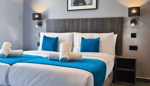Habitación estándar con 1 cama doble o 2 individuales