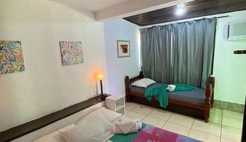 Habitación triple Deluxe, varias camas
