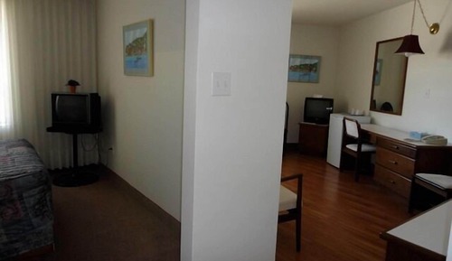 Suite Premium (1 Queen & 1 Single Bed & Sitting Room)