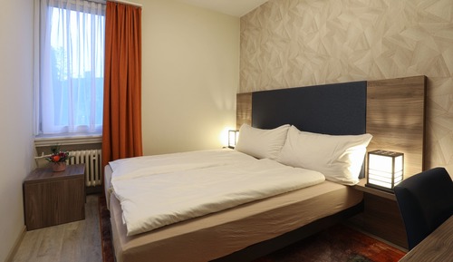 Habitación básica con 1 cama doble o 2 individuales