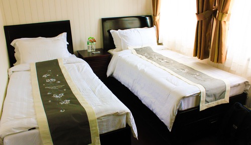 Habitación de lujo con 1 cama doble o 2 individuales