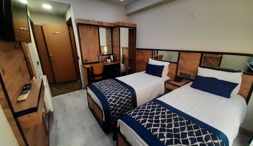 Habitación estándar con 1 cama doble o 2 individuales