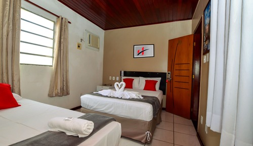 Habitación triple, varias camas