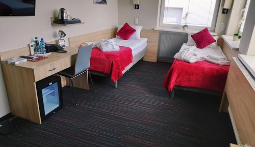 Habitación superior con 1 cama doble o 2 individuales