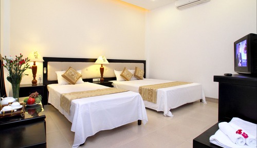 Habitación triple Deluxe, vistas al jardín