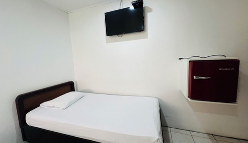 Habitación básica con 1 cama doble o 2 individuales
