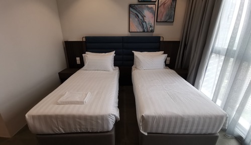 Suite ejecutiva, varias camas