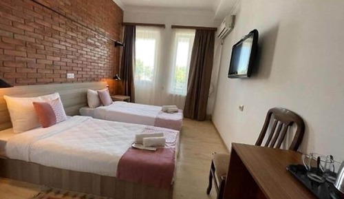 Habitación Deluxe con 1 cama doble o 2 individuales, balcón, vistas a la ciudad