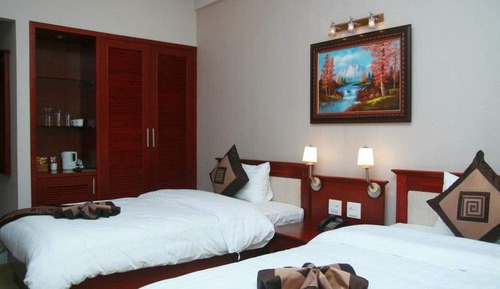 Habitación superior con 1 cama doble o 2 individuales