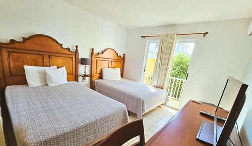 Habitación Deluxe, 2 camas dobles, balcón, vistas al jardín