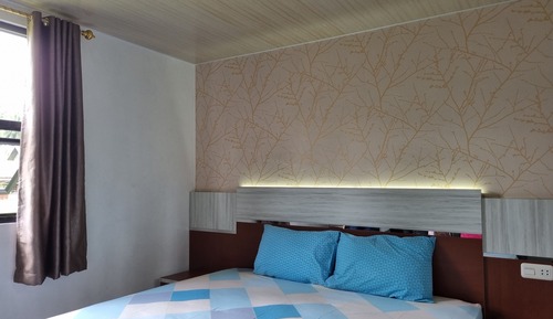 Casa adosada familiar, 2 habitaciones, vistas al jardín, entresuelo