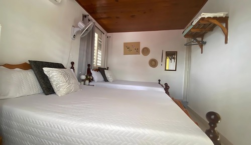 Habitación básica, 2 camas dobles, vistas al jardín, en edificio anexo
