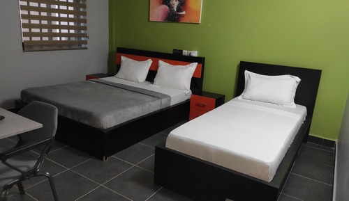 Habitación Deluxe con 1 cama doble o 2 individuales, varias camas