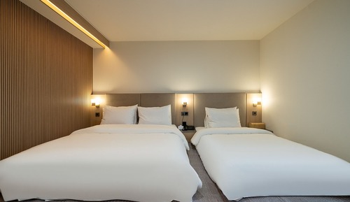Habitación familiar con 2 camas individuales