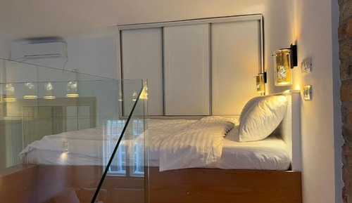 Suite Deluxe, 1 cama de matrimonio grande con sofá cama, vistas a la ciudad