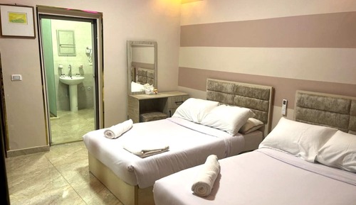 Habitación Deluxe con 2 camas individuales, vistas a la piscina