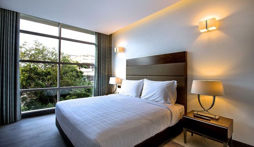 Suite Deluxe, 1 habitación, vistas a la ciudad, en esquina