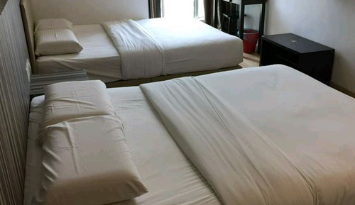 Habitación cuádruple familiar, 2 camas de matrimonio, vistas a la ciudad