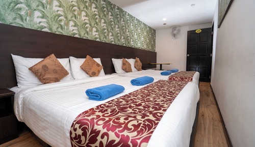 Habitación cuádruple Deluxe