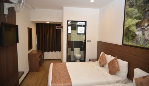 Habitación triple Deluxe