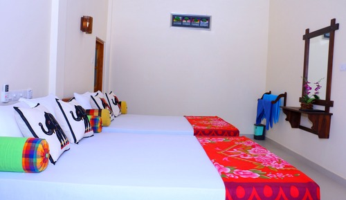 Habitación cuádruple Deluxe, vistas al jardín