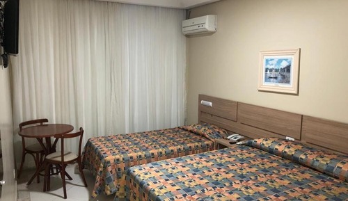 Habitación superior con 1 cama doble o 2 individuales (1 Cama Casal e 1 cama solteiro)