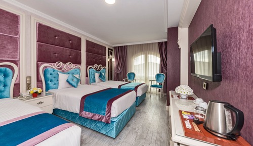 Habitación triple Deluxe