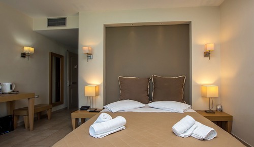Habitación triple, vistas al mar