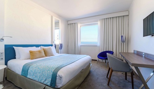 Suite ejecutiva, varias camas, vistas al mar