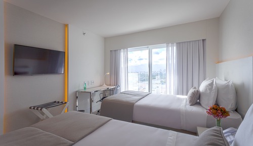 Habitación superior con 2 camas individuales, 2 camas individuales, vistas a la ciudad