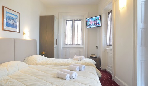 Habitación triple, vistas al mar