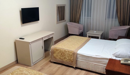Habitación estándar con 1 cama doble o 2 individuales