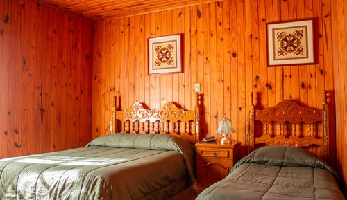 Habitación triple superior, varias camas