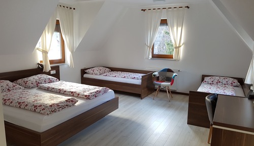 Habitación cuádruple familiar, vistas al jardín