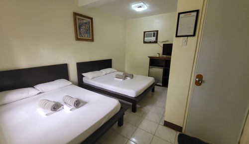 Habitación cuádruple Deluxe